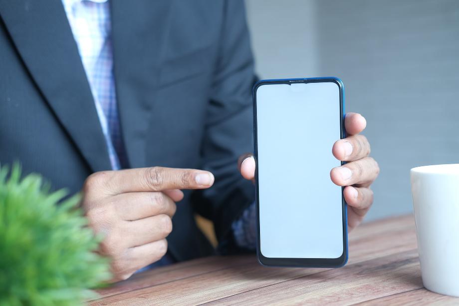 person holding black iphone 5